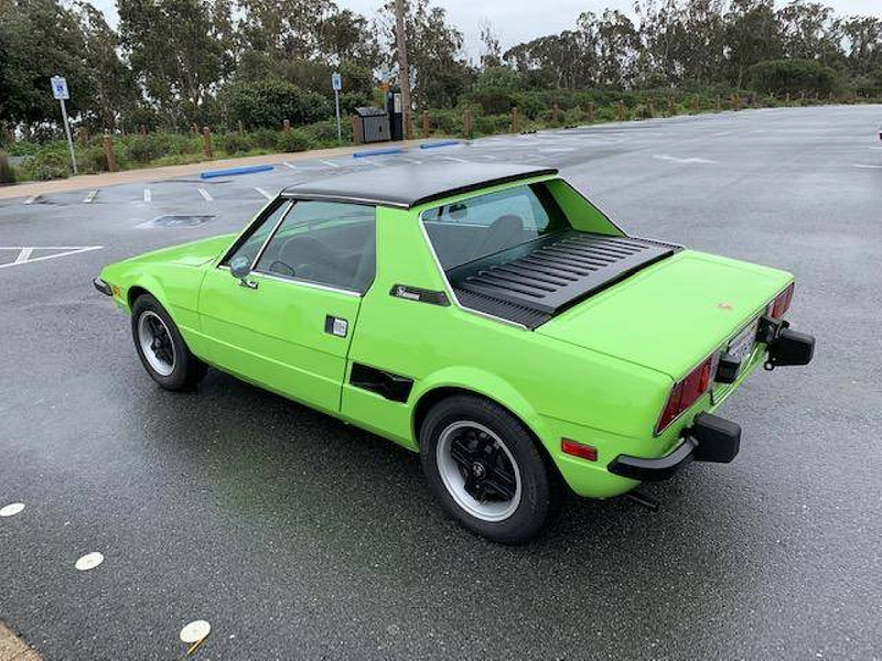 Illustration for article titled At $7,499, Could This Kermit Colored 1974 Fiat X1/9 Make it Easy Being Green?